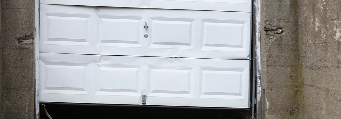 Garage Door Got Hit By A Car Dent Removal in Evanston, IL