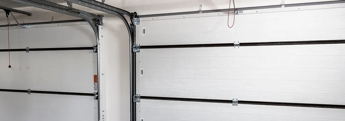 Fix Folding Garage Door Jerking in Evanston, Illinois