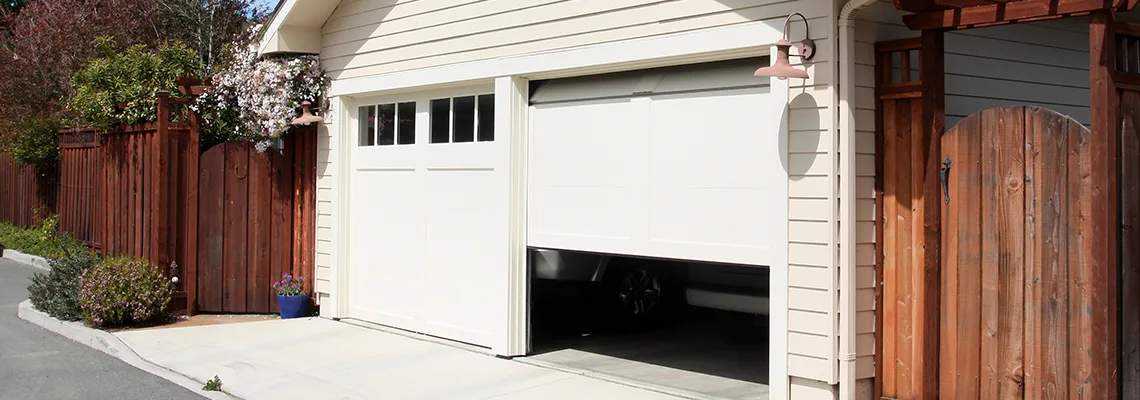 Fix Metal Garage Door Jerking in Evanston, Illinois